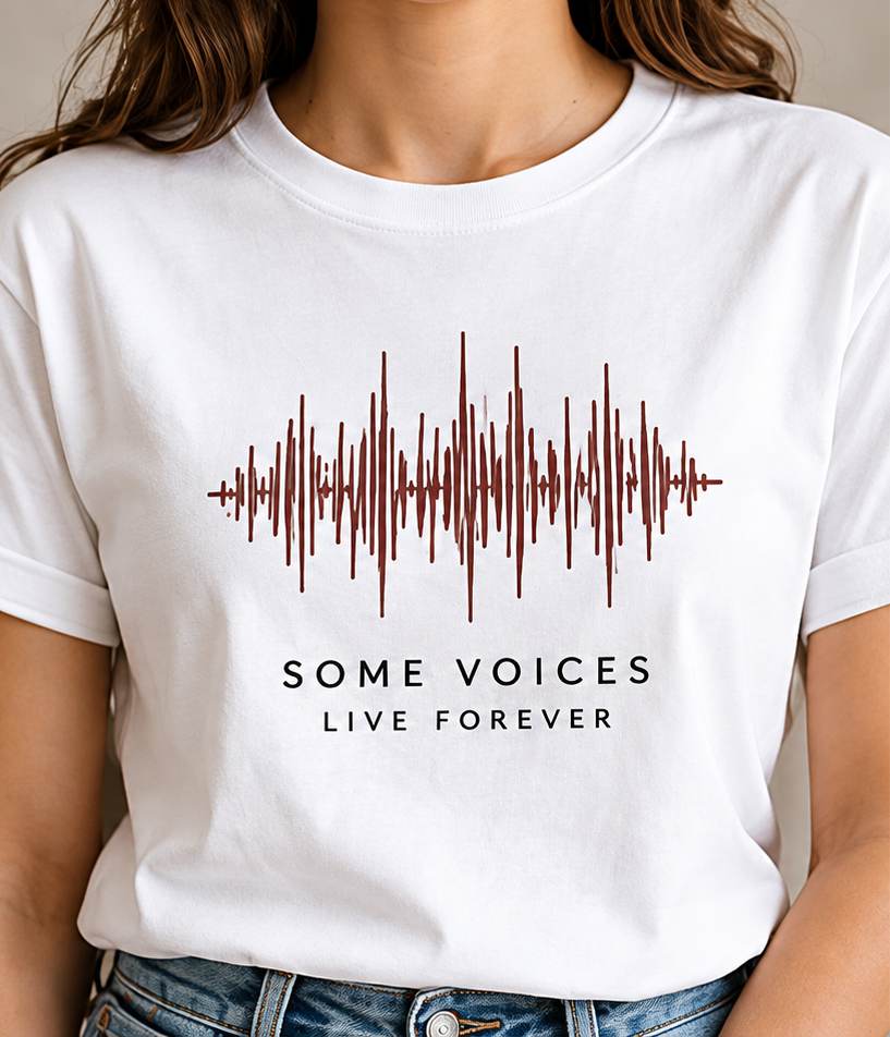 A white t-shirt printed with a waveform above the words “Some voices live forever”.